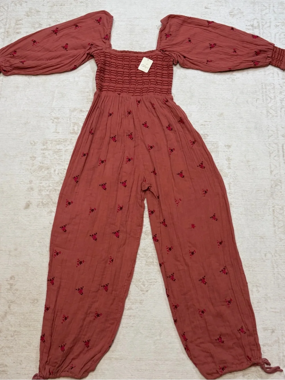 Free People Rose Mauve Off-Shoulder Smocked Floral Jumpsuit